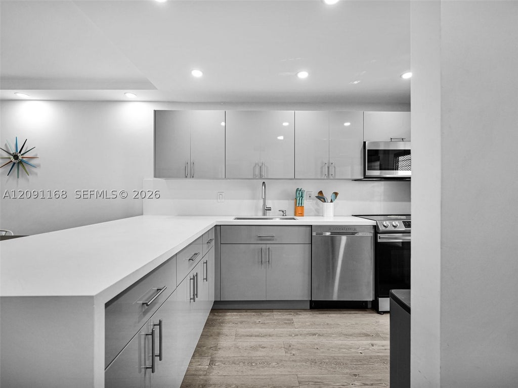 Photo of 400 SE 10th St #303, Deerfield Beach, FL 33441 (MLS # A12091168)