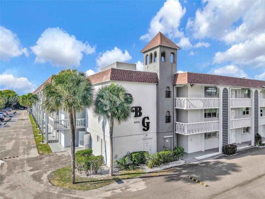 Photo of 400 SE 10th St #303, Deerfield Beach, FL 33441 (MLS # A12091168)