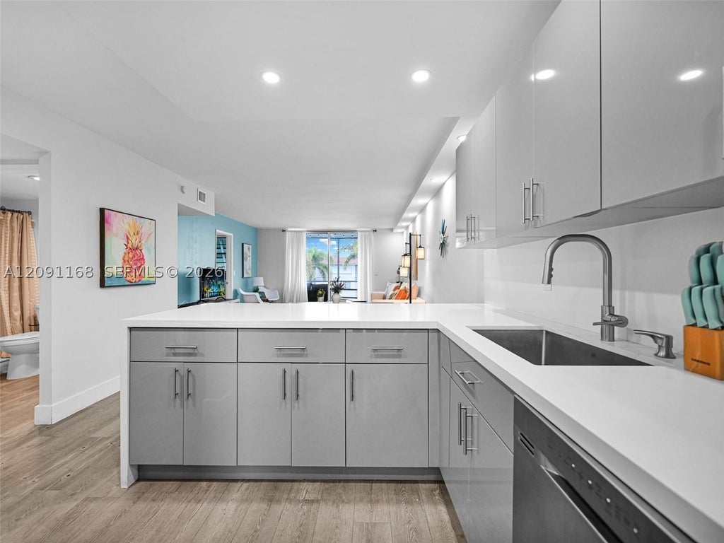 Photo of 400 SE 10th St #303, Deerfield Beach, FL 33441 (MLS # A12091168)