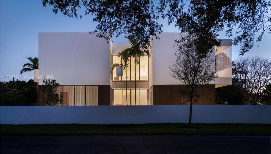 Experience sophisticated luxury at this newly constructed modern oasis perfectly situated in the Sunset/South Miami area! This corner lot designer residence truly blurs the line of indoor/outdoor living. Upon entry, you are greeted w/incredible natural light, natural oak flooring & doors, & sophisticated design. The gourmet chef's kitchen features Miele appliances, hand-crafted wood cabinetry, marble countertops, & massive center island. The primary suite features dual walk-in closets w/stunning cabinetry, private terrace w/custom railings, & spa-like limestone adorned bathroom w/separate tub/shower & natural oak vanities w/dual sinks. Additional bedroom suites are generously sized and feature high-end design. Seize this unique opportunity to claim this never lived-in designer residence!