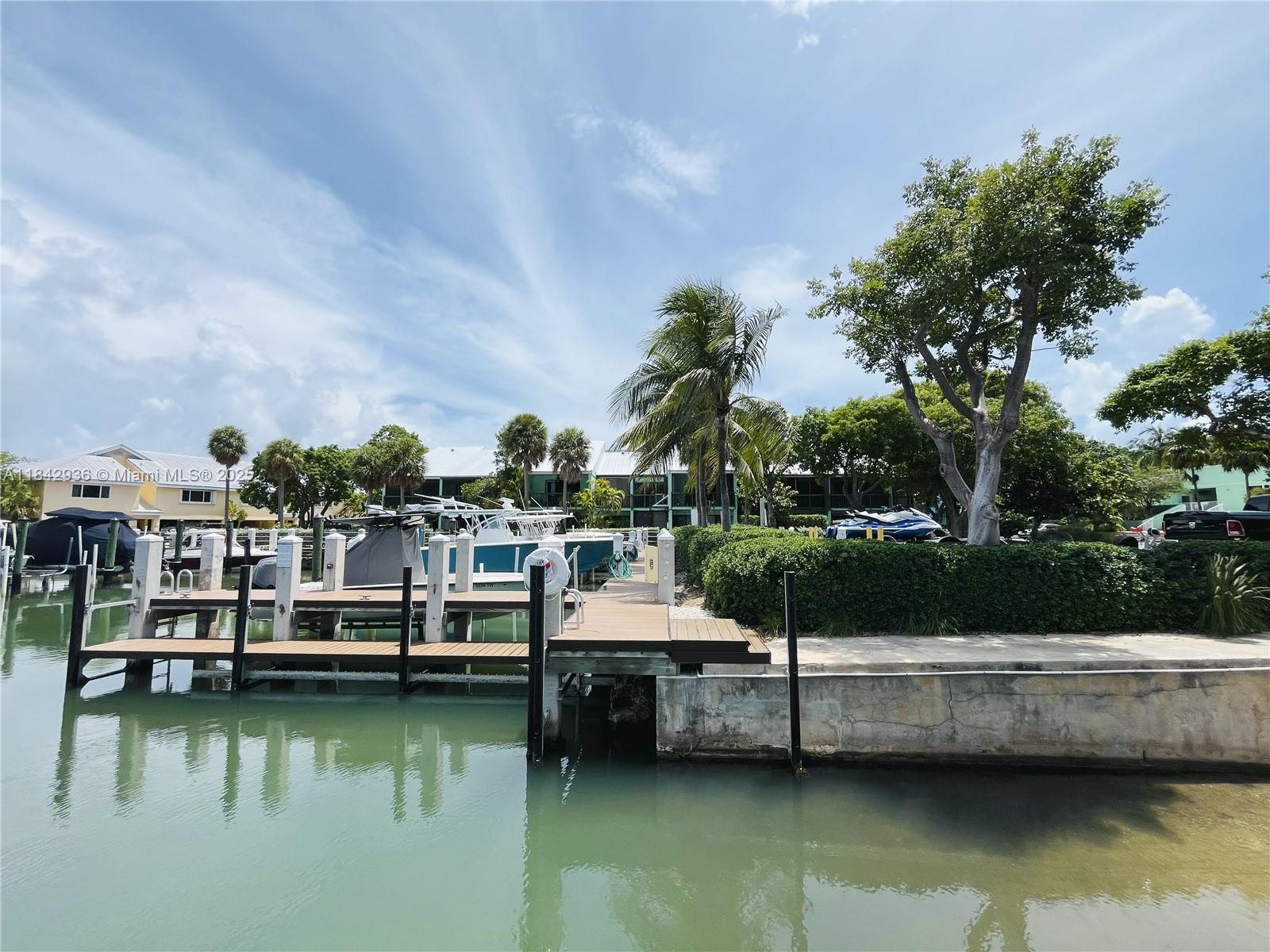 Fully furnished 2BR/2BA condo in gated Landings of Largo. This second-floor unit offers a split floor plan, granite counters, in-unit laundry, and a private balcony with pool views. Enjoy the ultimate Keys lifestyle with access to a marina, boat ramp, 2 heated pools, tennis courts, fitness center, clubhouse, and more. 2 assigned parking spaces.