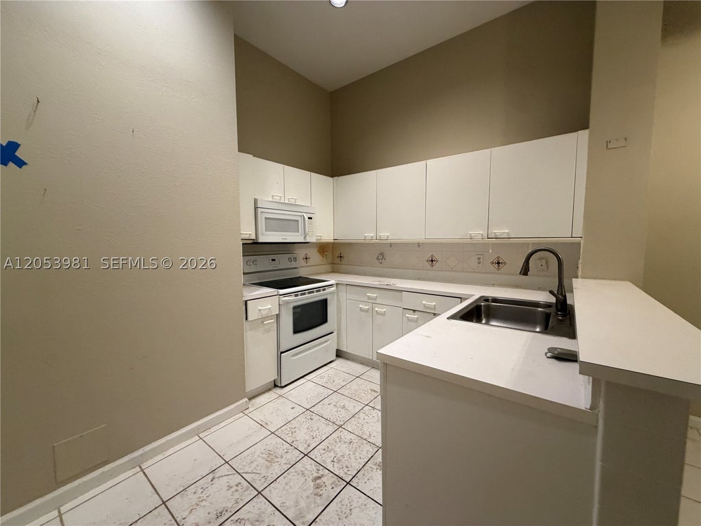 Photo of 5374 Monterey Cir #A, Delray Beach, FL 33484 (MLS # A12053981)