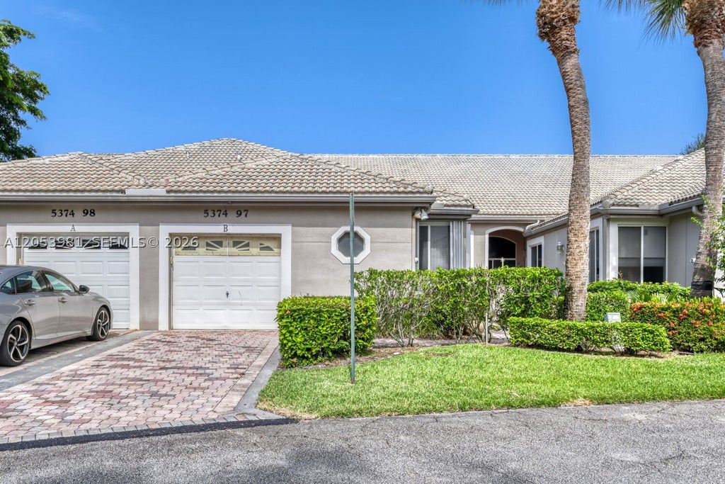 Photo of 5374 Monterey Cir #B, Delray Beach, FL 33484 (MLS # A12053981)