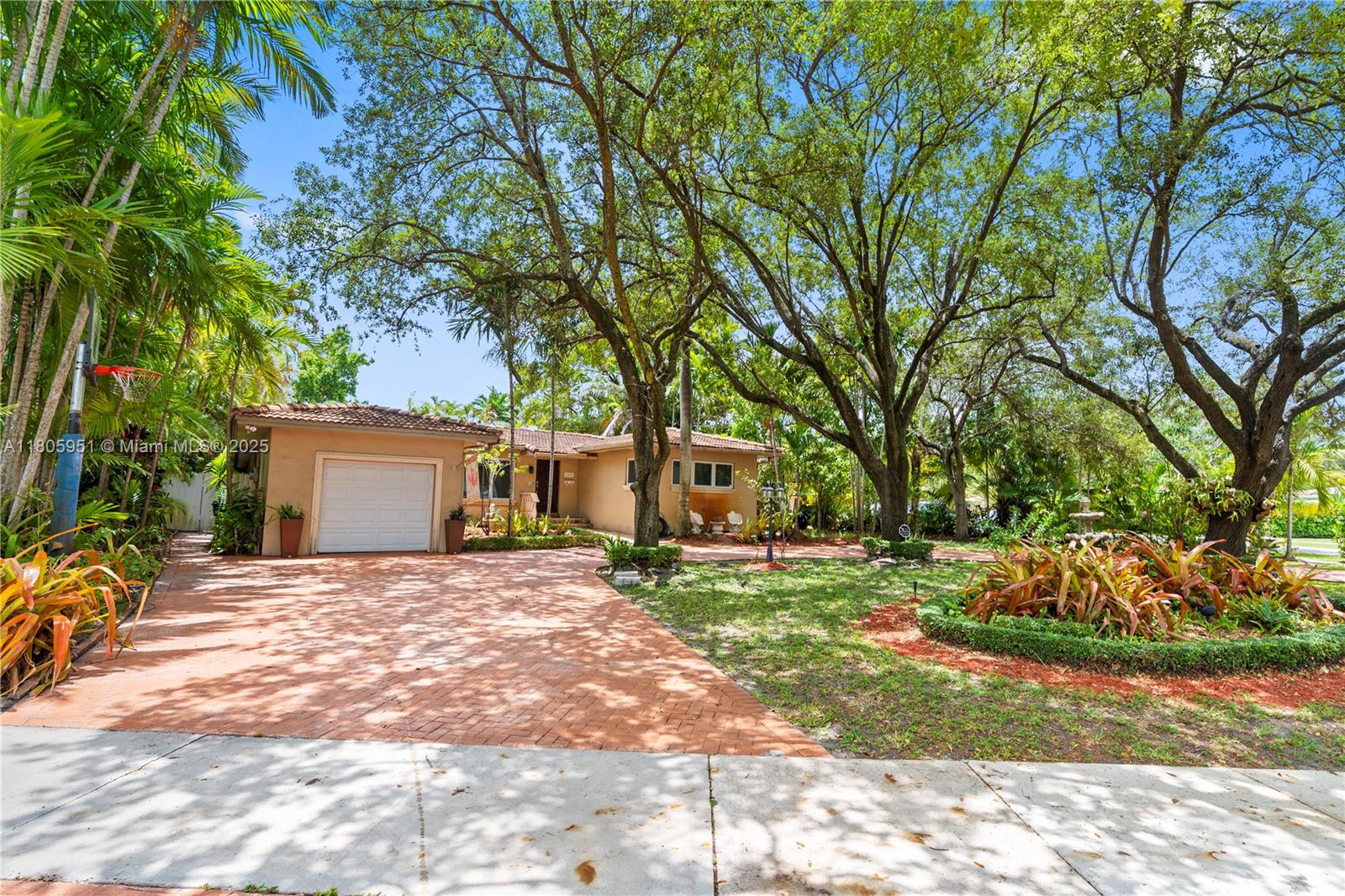 This home is lakefront living at its finest! It is a unique, move-in ready single family home in Miami Springs with 3 beds, 2 baths + DEN/office, and a pool set on an oversized lot almost 20,000 sqft. with private lakefront access. The lakefront access comes with your own dock for fishing and kayaking or to view the gorgeous, serene sunsets! This rare gem offers the perfect blend of tranquility and luxury. It features direct lake access, It impact windows & doors, granite countertops, NEW APPLIANCES, solid wood kitchen cabinets, closets built-ins. private pool oasis. Cool off in your large in-ground pool surrounded by lush landscaping with mamey, guanabana, mango, avocado just to name a few. property will also soon boast a brand-new roof which is in the process of being replaced.