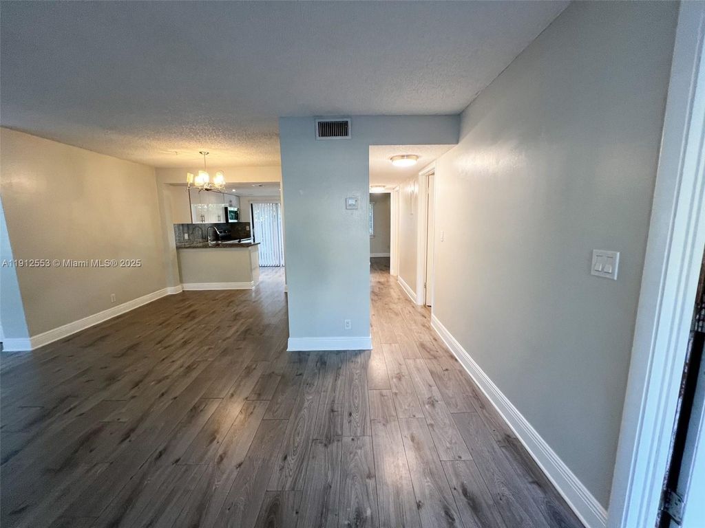 Photo of 185 Wimbledon Lake Dr #185, Plantation, FL 33324 (MLS # A11912553)