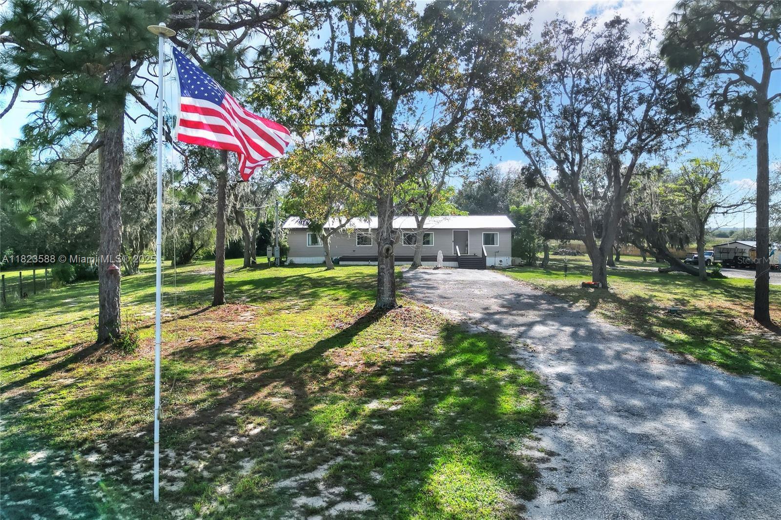 Welcome to a unique homestead on 4.89 private, unrestricted acres—no HOA or CDD! The main home is a 3-bed, 2-bath Biltmore model (1982) with approx. 1,800 sq. ft., featuring a fireplace, central air/heat, and new metal roof. A second 1-bed, 1-bath cottage with extra room offers flexible space for guests or work. Enjoy a spring-fed pond, chicken coop, large shed, and ample parking for RVs and toys. Just 2 miles from Sebring Raceway and close to town, this property blends rural charm with real-world convenience. Ideal for a hobby farm, retreat, or family compound.