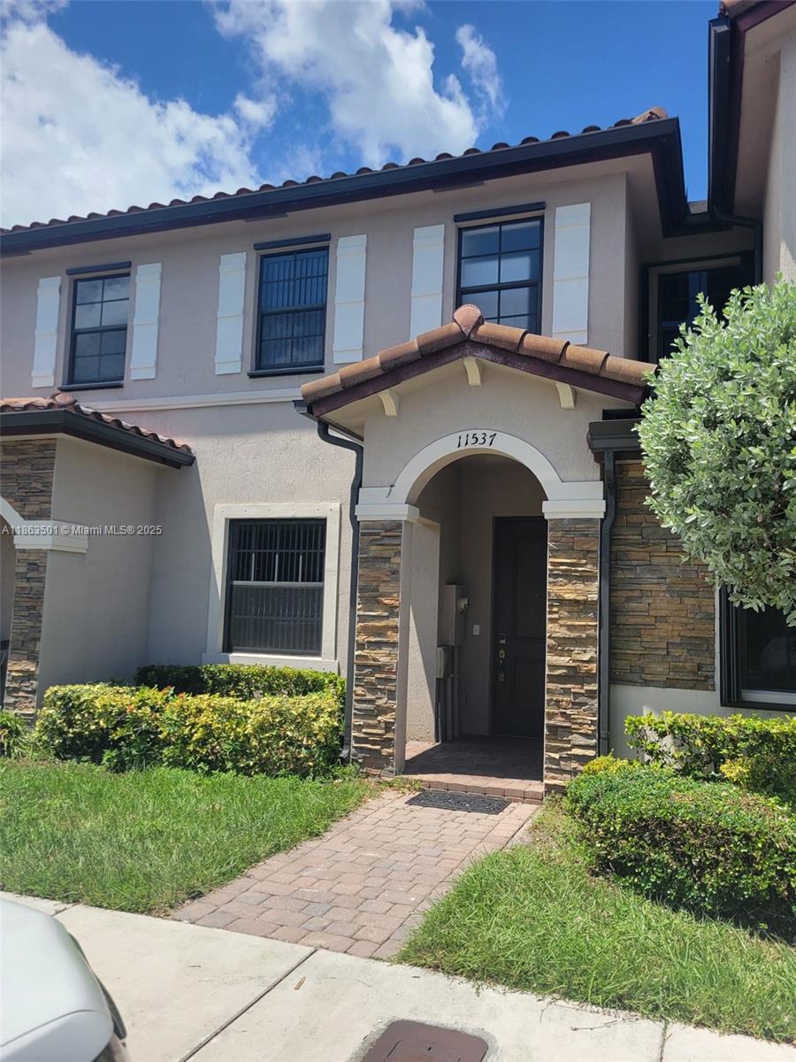 Welcome to Coco Palm Estates at ARTESA! This beautifully maintained 2-bedroom, 2.5-bath townhome offers modern comfort and convenience in one of the area's most desirable gated communities. Built in 2016, this home features a spacious open-concept layout with tile flooring throughout the first floor, a convenient half bath, and a stylish kitchen equipped with stainless steel appliances for everyday living. Upstairs, you'll find two generously sized bedrooms with carpet flooring, each featuring its own bathroom and ample closet space. Enjoy your private, fenced backyard—ideal for relaxing, barbecuing, or hosting guests. Located with easy access to the Turnpike, top-rated schools, shopping, and dining. This is a must-see rental for those seeking style, space, and a prime location!