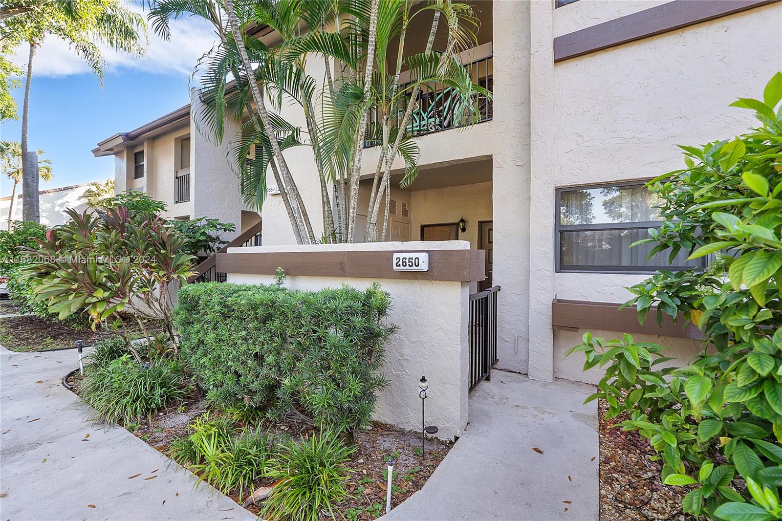 Discover Your Ideal Rental In Pond Apple Place! This Spacious 2 Bed, 2 Bath Unit Features Tile Floors Throughout & Abundant Natural Light. The Modern Eat-In Kitchen Is Equipped With Stainless Steel Appliances, Beautiful Granite Countertops, & Updated Cabinets. Enjoy The Convenience Of A Stacked Washer & Dryer In-Unit. The Bright Florida Room Includes Built-In Shelving And Access To A Sun Room Which Offers Lovely Water Views, Perfect For Unwinding. The Primary Bedroom Boasts A Large Window & A Updated En-Suite Bath With A Dual Sink Vanity, Shower Stall With Glass Door, & A Walk-In Closet With Shelving. An Additional Full Bath With A Tub And Updated White Vanity Completes The Home. Convenient Storage Closet. Community Amenities Include A Pool & Child Play Area. Don't Miss This Opportunity!
