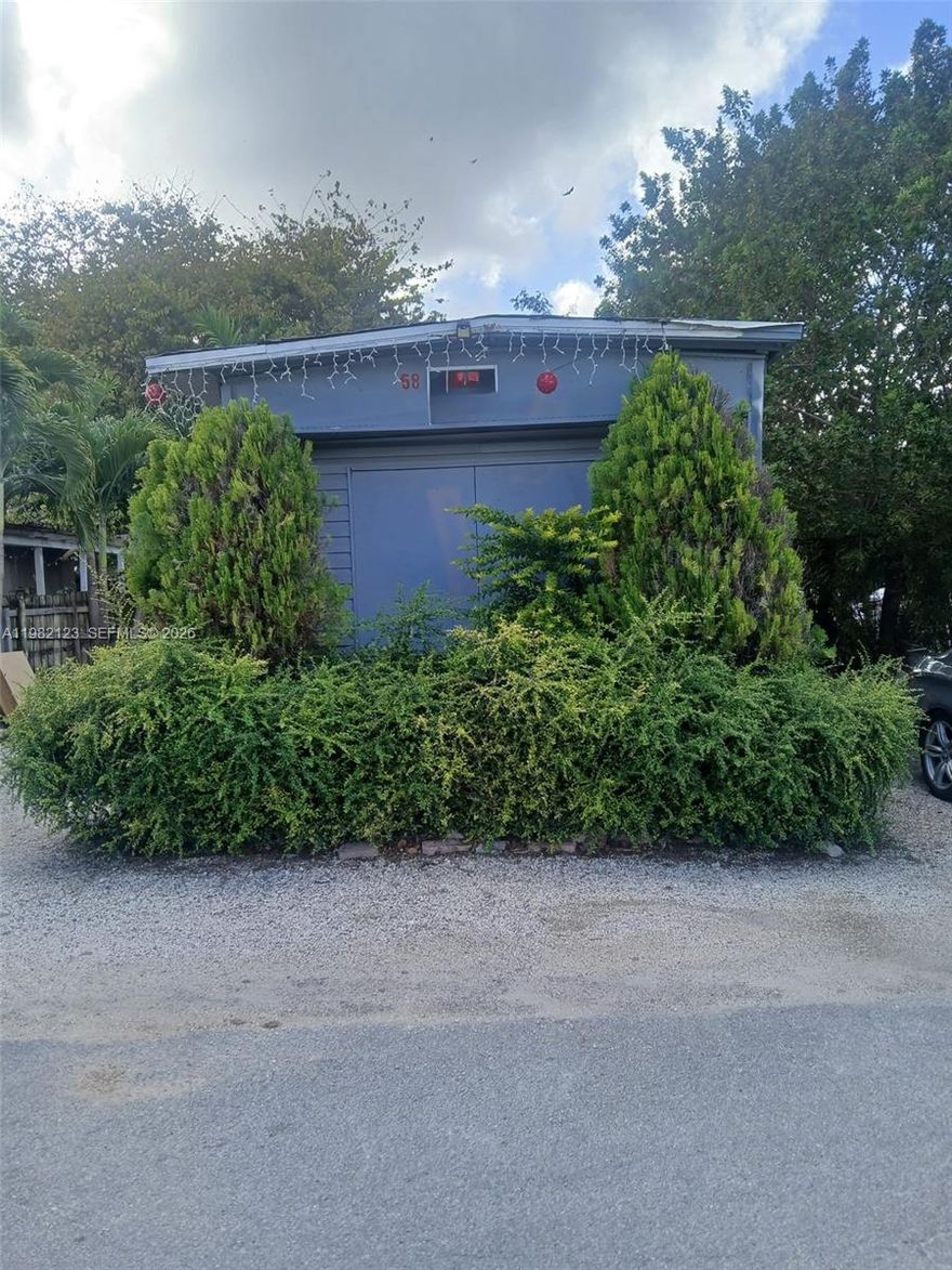 Great TLC opportunity to own a single wide near the last  exit in the turnpike Homestead, just where the road begins to got onto the Florida Keys. Great fixer upper with double entrance and nice size yard. Land is leased and no rental is allowed.