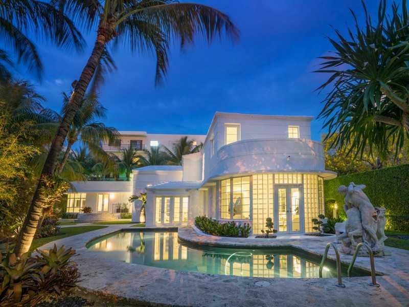 This Iconic Art Deco landmark masterpiece designed by renowned architect Robert E. Collins offers 4BR, 4.5BA, totally renovated to perfection w/custom luxury finishes. Almost 4,000 SF interior w/171ft of waterfront. Fully gated, lushly landscaped 13,500SF lot, perfect to entertain family & friends w/French doors opening to the dramatic black bottom pool, rooftop terrace, gourmet Poggenpohl kitchen w/Gaggenau wine cooler, & Crestron sound system. The ultimate SoBe living experience awaits you! Perfection!