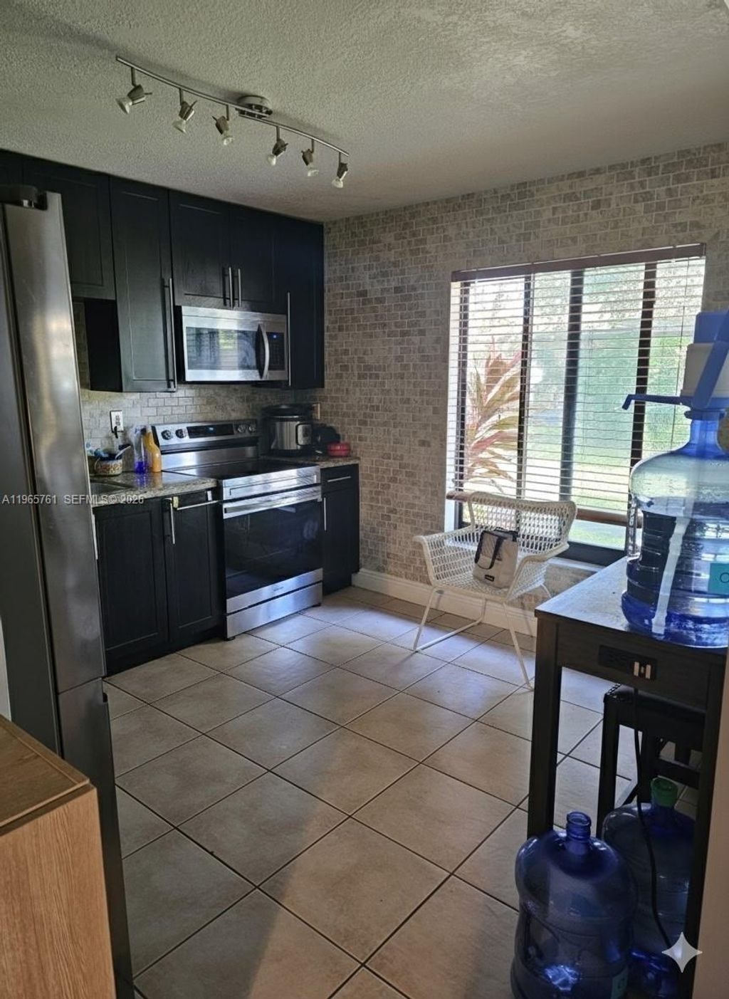 Photo of 7509 SW 26th Ct #5, Davie, FL 33314 (MLS # A11965761)