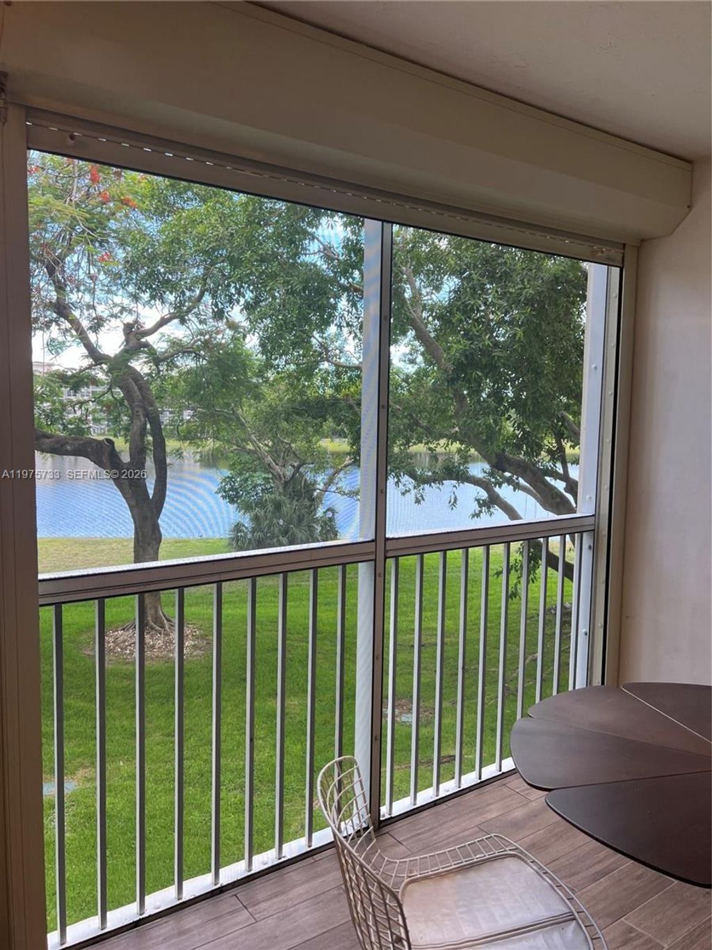 Photo of 2940 N Course Dr #305, Pompano Beach, FL 33069 (MLS # A11975733)