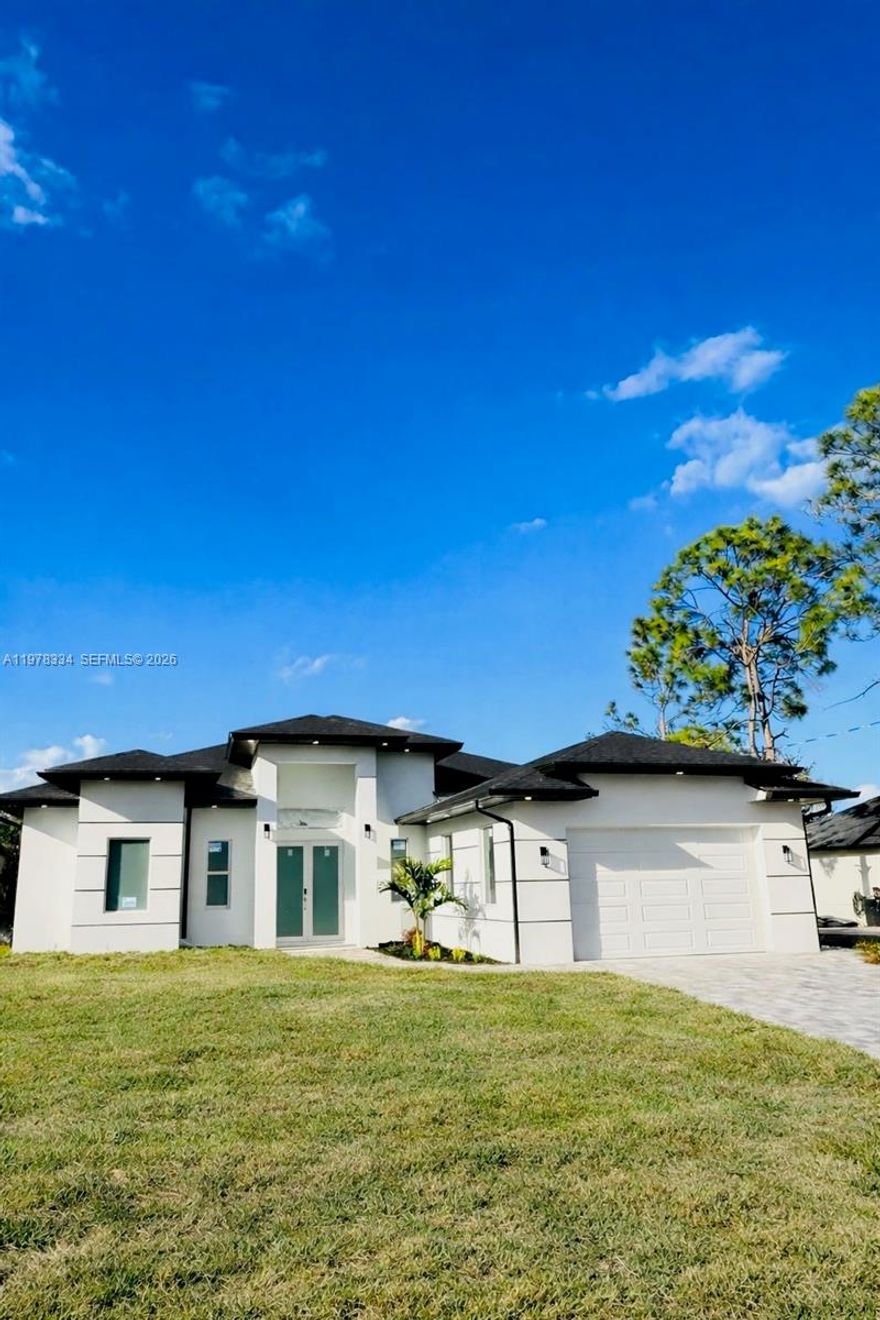 Brand new 3-bedroom, 2-bath home offering nearly 2,000 sq ft of living space in Lehigh Acres. This property features modern finishes throughout, elegant marble flooring, and a thoughtfully designed layout with spacious living areas. Enjoy a large yard perfect for entertaining, relaxing, or future customization. A great opportunity to own a newly constructed home with contemporary style and plenty of outdoor space.