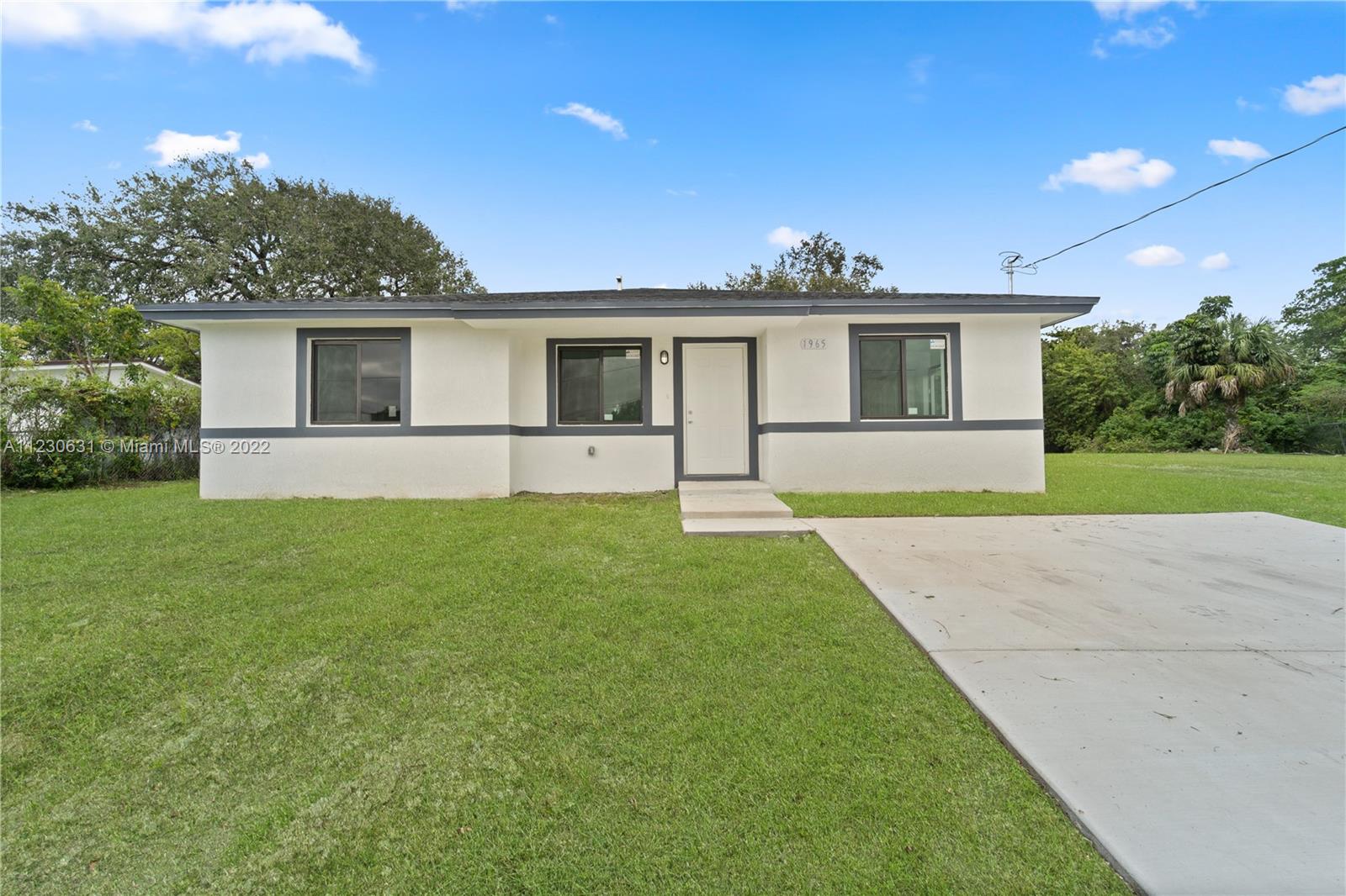 Photo 3 of 23 of 1965 NW 173rd St house