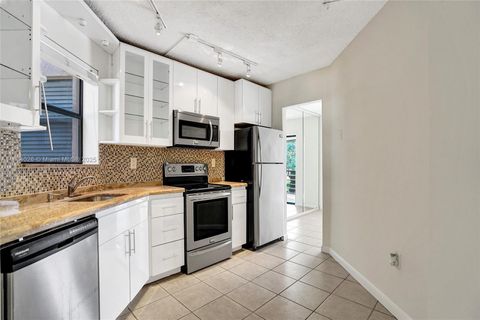 Photo of 6655 W Broward Blvd #309, Plantation, FL 33317 (MLS # A11864026)