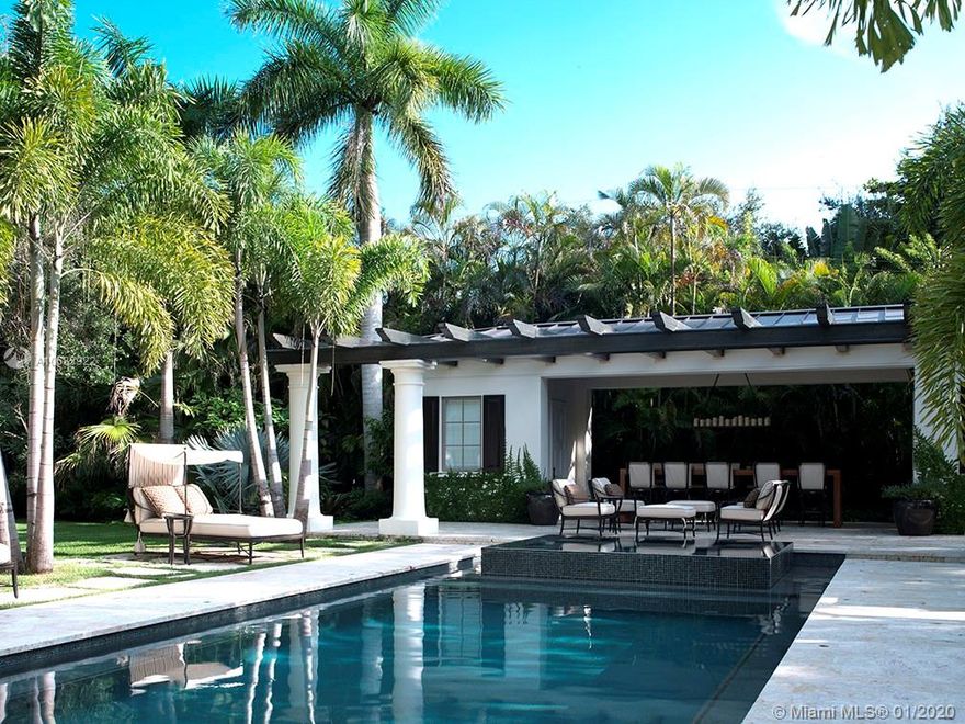 This stunning Pinecrest estate designed by Portuondo Perroti embodies timeless elegance combined w modern luxuries.Nestled on a tree lined 38,368 sf lot this home features 6 beds,8/1 baths.The Chef’s kitchen-an epicurean dream-includes Miele,SubZero & Wolf appliances,custom wood cabinets, granite counter tops &  marble backsplash. French doors, limestone & herringbone wood floors, French oak paneling adorn the bar/media room completed by a 1000 bottle wine cellar.Master suite boasts fireplace,his/hers closets w walnut built ins, bath w marble, onyx & jade baths counter tops plus infinity soaking tub.Lounge by the infinity pool w murano glass accents, porch for dining/entertaining & full outdoor kitchen.3 car garage,elevator,Crestron system & whole house generator complete this masterpiece.