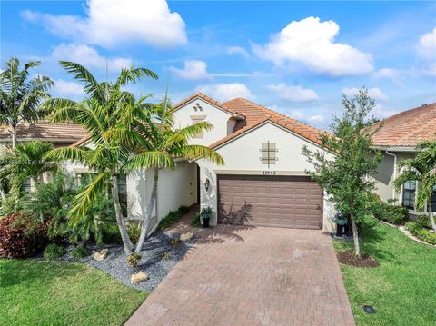 Photo of 11943 Leon Cir N, Parkland, FL 33076 (MLS # A11886055)