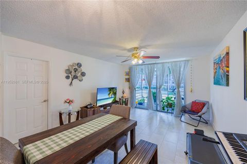 Photo of 9100 Lime Bay Blvd #209, Tamarac, FL 33321 (MLS # A11952681)