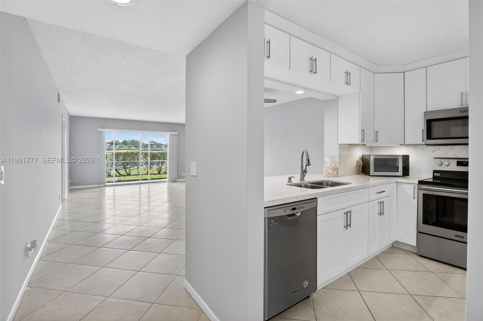 View photos, virtual tours, details... 901 SW 128th Ter 102A