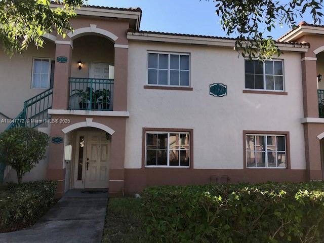 Enjoy the lake view from this first story lake front unit, all tile floors, washer, dryer, dishwasher inside. Gated and guarded community. Assigned parking. Next to the Outlet Mall.