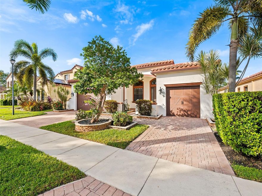 Welcome to Estada at Monterra — one of Cooper City’s most desirable family-friendly gated communities! Perfectly positioned on a serene lakefront lot, this home offers 3,411 sq. ft. of total space, including 2,480 sq. ft. of comfortable living area. The 4-bedroom, 3-bath layout features a 3-way split floor plan with soaring ceilings and a bright, open feel. The kitchen includes granite countertops, stainless steel appliances, and plenty of space to gather. Enjoy peace of mind with impact windows and doors, plus a 3-car garage for all your storage needs. The fenced backyard offers lake views and room for a pool. Enjoy resort-style amenities — clubhouse, gym, pool, playground, tennis & basketball courts — and proximity to A+ schools, shopping, dining, and highways.