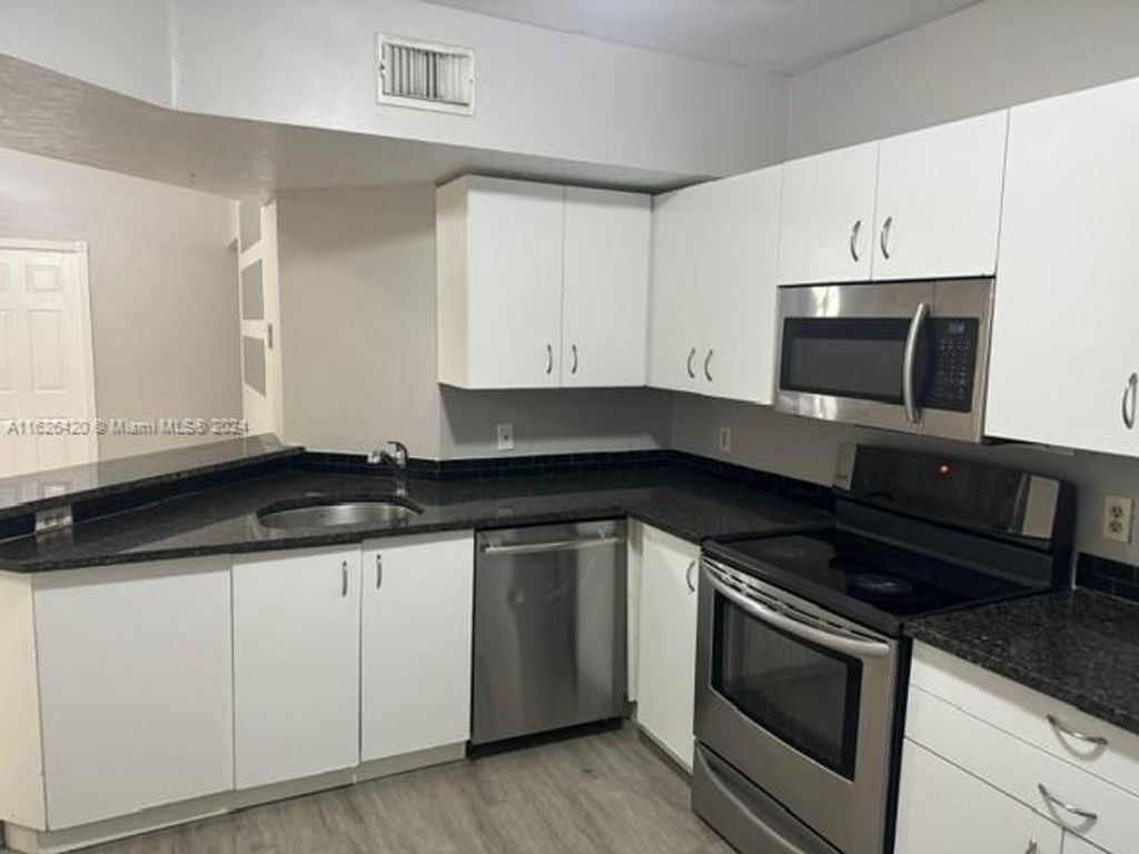 Photo of 8701 Wiles Rd #303, Coral Springs, FL 33067 (MLS # A11626420)