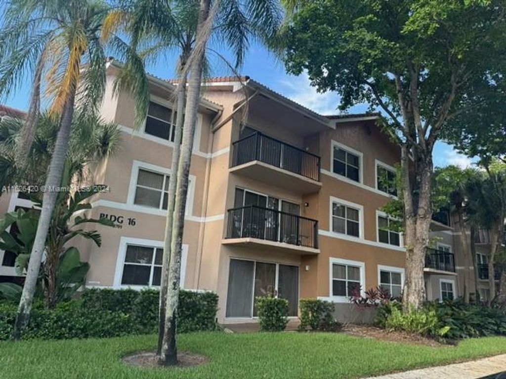 Photo of 8701 Wiles Rd #303, Coral Springs, FL 33067 (MLS # A11626420)