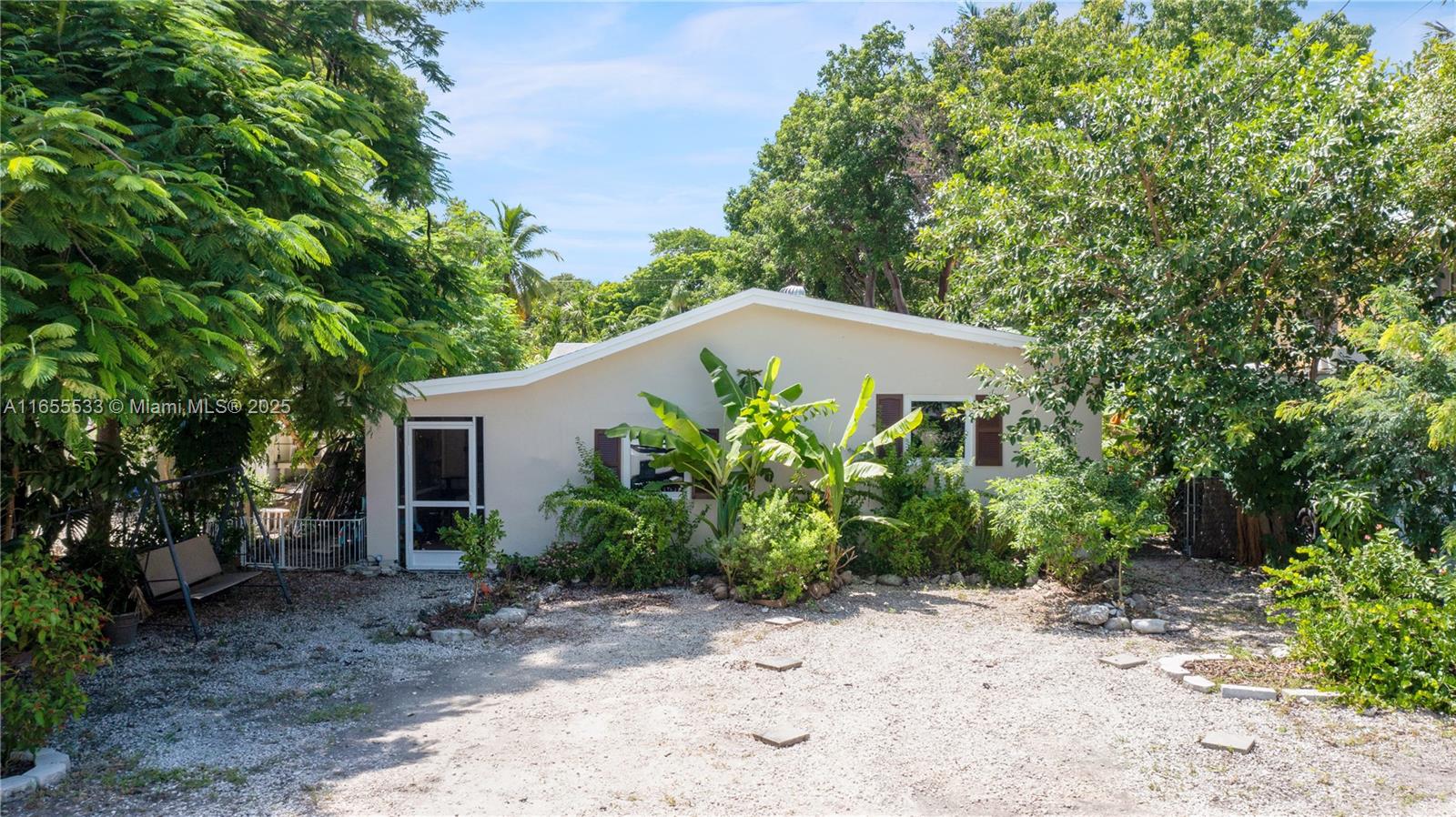 Welcome to 711 Sharon Place, Key Largo, FL 33037—a charming tropical retreat in the heart of the Florida Keys! This well-maintained 3-bedroom, 2-bathroom home offers a perfect blend of comfort and coastal style. It boasts spacious bedrooms. The backyard is a true oasis, complete with lush landscaping, mature palms, a butterfly garden, and fruit trees for everyone to enjoy. There's ample space for outdoor entertaining, making it ideal for gatherings and relaxation. Plus, you're just a short 5-minute walk from the beach, perfect for enjoying the sun and surf. Conveniently located near top boating, fishing, dining, and the famous John Pennekamp Coral Reef State Park, this home is perfect for those seeking the best of Key Largo. Don’t miss out—schedule your showing today!