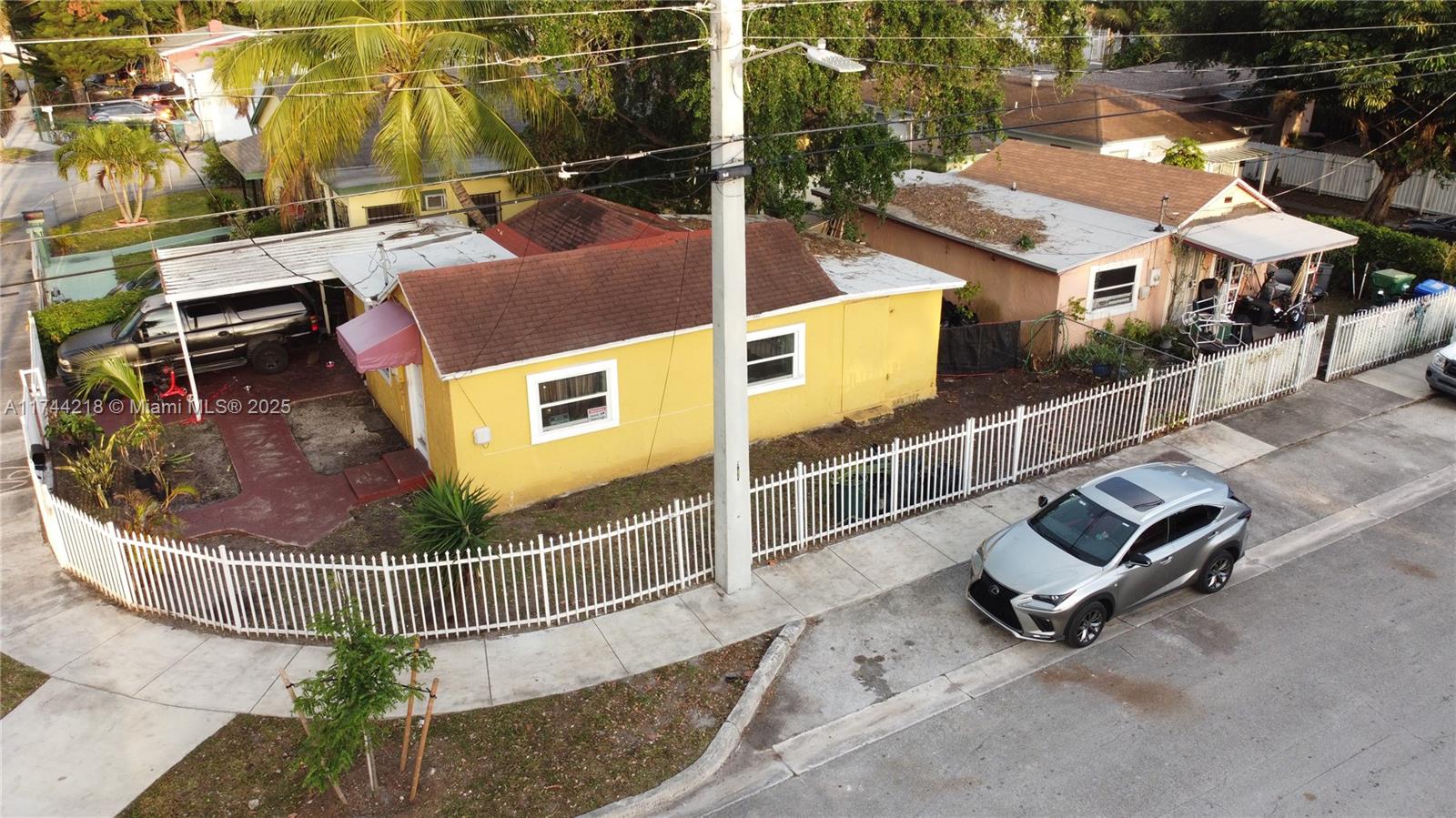 Great detached duplex located in developing area. Two separate houses and Lots have separate entrances, water meters, and address. Potential development site for the future. Area is developing rapidly and has tons of potential. Close to I-95, Design District, shopping and more. Near Downtown, Wyndwood, and Design district. Currently Rented for $3,700 per month. Great Cashflow property.