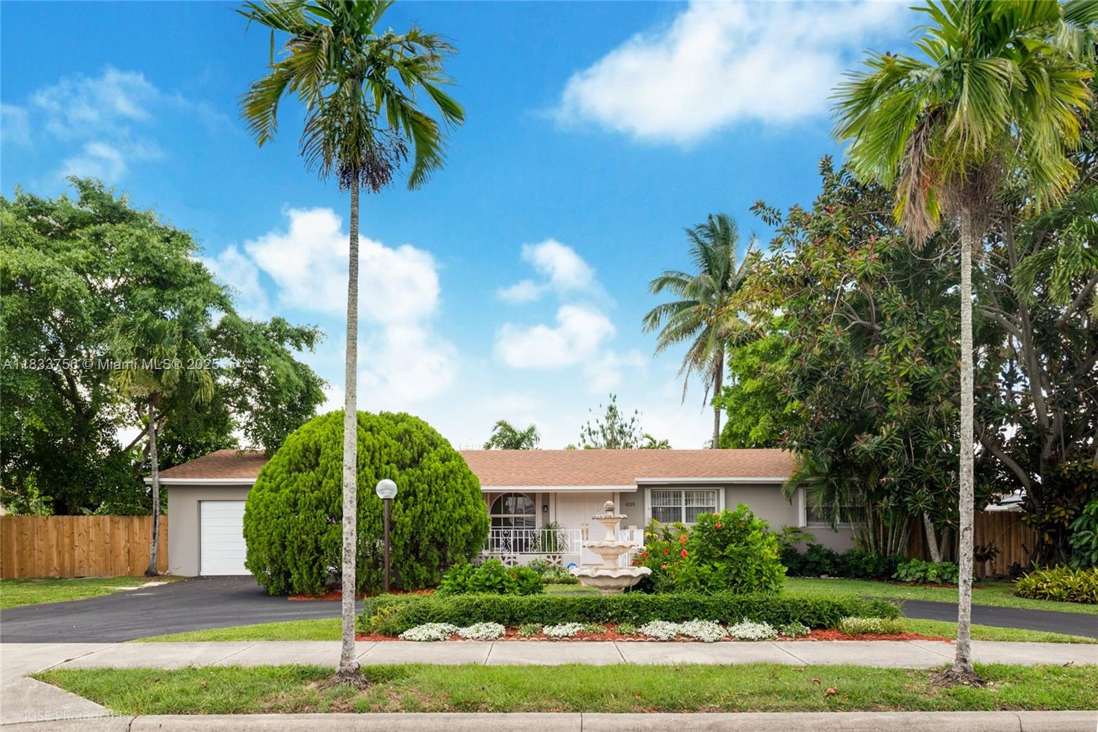 Wonderful residence in popular Westchester neighborhood ready for the next chapter! A home ahead of its time, this gem checks the boxes! Per appraiser living area is 2,616sf. Fabulous social spaces include formal living, formal dining, and huge poolside family rooms that will accommodate the happiest gatherings. A superb, heart-of-the-home kitchen features eat-in dining, snack court, prep island, and cabinets galore. Main home boasts 3 spacious bedrooms; a separate guest suite w/ private entrance is fantastic for generational living. Raising the bar on alfresco living this backyard oasis shines w/ the most divine swimming pool, expansive covered terrace, and the landscaping all around is lush and blooming. Extras include hurricane protection, 3-year roof, and indoor laundry/utility room.