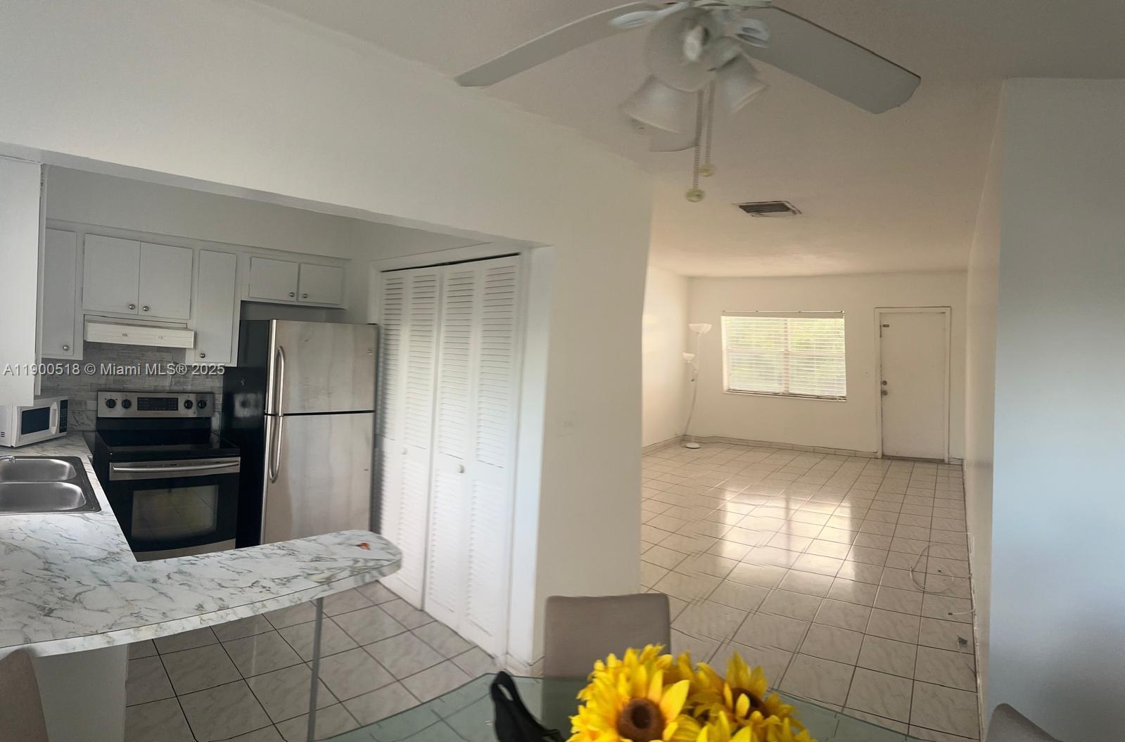 Bright and comfortable 1-bedroom, 1-bath condo available for rent on the top (4th) floor of a well-maintained building. This inviting home features tile flooring throughout, a modern kitchen with stainless steel appliances and a breakfast counter, and a spacious bedroom with a walk-in closet. Large windows fill the space with natural light, creating a warm and open feel.
The building has been recently updated with a new roof, elevator, and septic system, offering peace of mind and a clean, well-kept environment. Enjoy the convenience of great property management and a quiet community that’s close to everything you need.
Perfect for anyone seeking a clean, bright, and easy-to-maintain home in a well-cared-for building