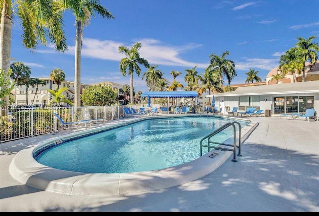 Photo of 440 Paradise Isle Blvd #406, Hallandale Beach, FL 33009 (MLS # A12012096)