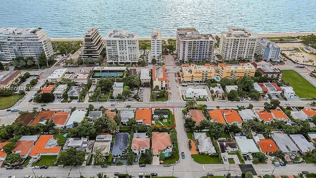 Rare Surfside Opportunity – Build Your Dream Home! Prime 6,869 sq. ft. corner lot just 5 min walk to Surfside’s pristine beaches & Four Seasons Hotel. Build up to 4,500 sq. ft. Large lots like this are rare! Existing fully renovated home generates $70K+/yr on Airbnb, sold as-is, furnished, with future bookings included – turnkey income while you plan. Experienced Surfside developers can manage the entire build for you – from design to completion. Owner financing available with 50% down payment. Don’t miss this chance to own & build in one of Surfside’s most desirable locations!