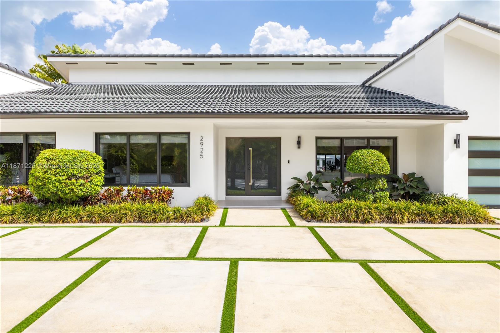 This 4-bed, 4-bath Miami Waterfront Modern Masterpiece, completely renovated, pairs sleek interiors with resort-style outdoor living. Walls of glass flood the home with natural light and frame stunning wide-water views. The chef’s kitchen boasts an oversized waterfall island, custom cabinetry, and premium appliances. Outside is where the magic happens: sparkling pool with in-water loungers, sandy fire pit lounge, summer kitchen, and an extensive covered patio built for entertaining. With 70 ft of prime waterfront and direct Intracoastal access/no fixed bridges, it’s a yacht owner’s dream. Perfectly placed minutes from Sunny Isles, Bal Harbour, and Aventura—this turnkey showpiece delivers the ultimate Miami lifestyle with unbeatable long-term value.
