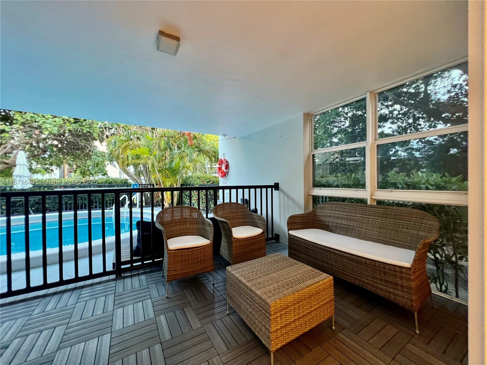 Rarely available corner lanai with direct pool access in a charming 10-unit boutique building just steps from the beach. Bright SW unit with white floors, impact windows and doors, and private street-level entry that feels like a home. Spacious poolside lanai ideal for relaxing or entertaining. Modern kitchen with stainless steel appliances, updated bathroom, and in-unit washer plus free laundry in the building. Offered semi-furnished with a TV set, TV console, tall cabinet, kitchen counter stools, and lanai furniture set. Assigned parking included, plus FOB beach access only a 5-minute walk away. A modern and convenient Key Biscayne find close to parks, shops, and restaurants.