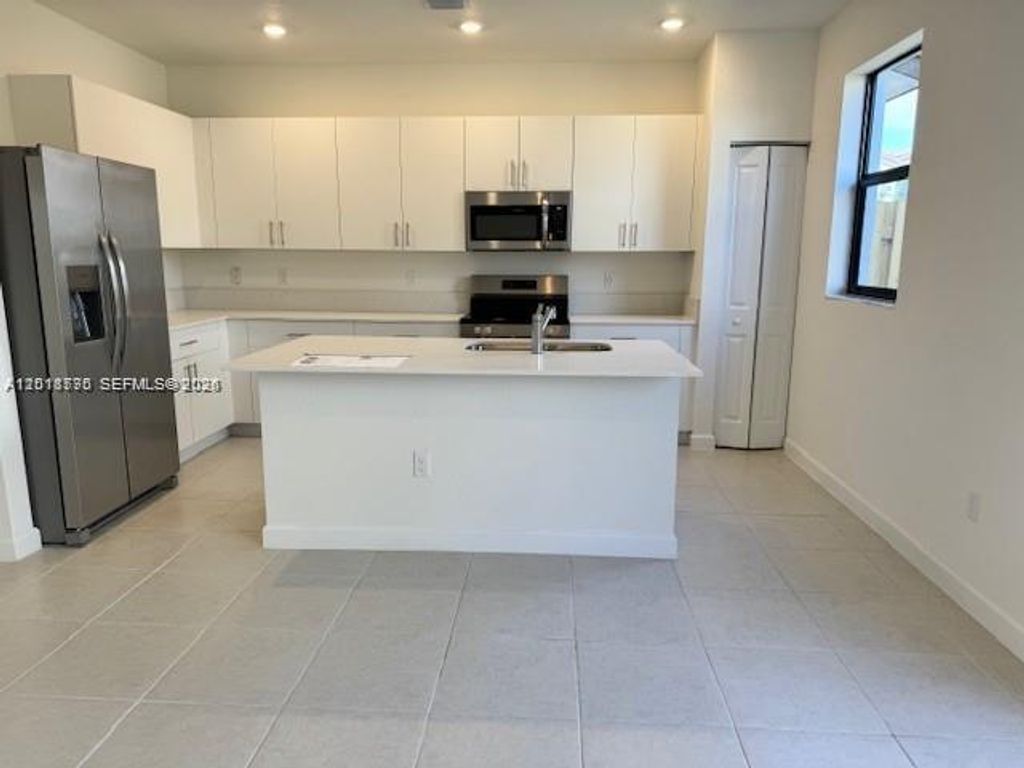 Photo of 273 SW 159th Ln #273, Pembroke Pines, FL 33027 (MLS # A12018775)