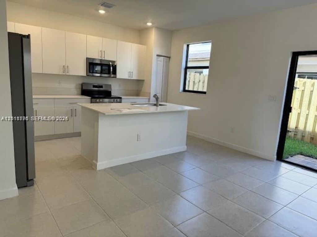 Photo of 273 SW 159th Ln #273, Pembroke Pines, FL 33027 (MLS # A12018775)