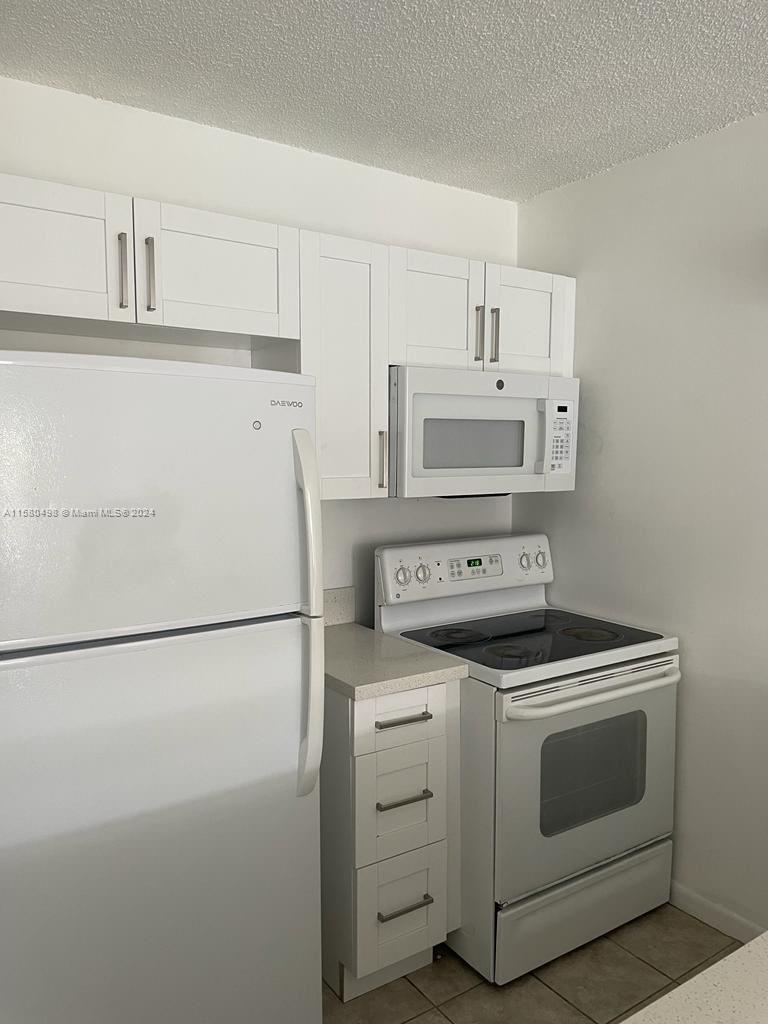 Property for Sale at 2771 Riverside Dr 307-A, Coral Springs, Broward County, Florida - Bedrooms: 1 
Bathrooms: 1  - $199,900