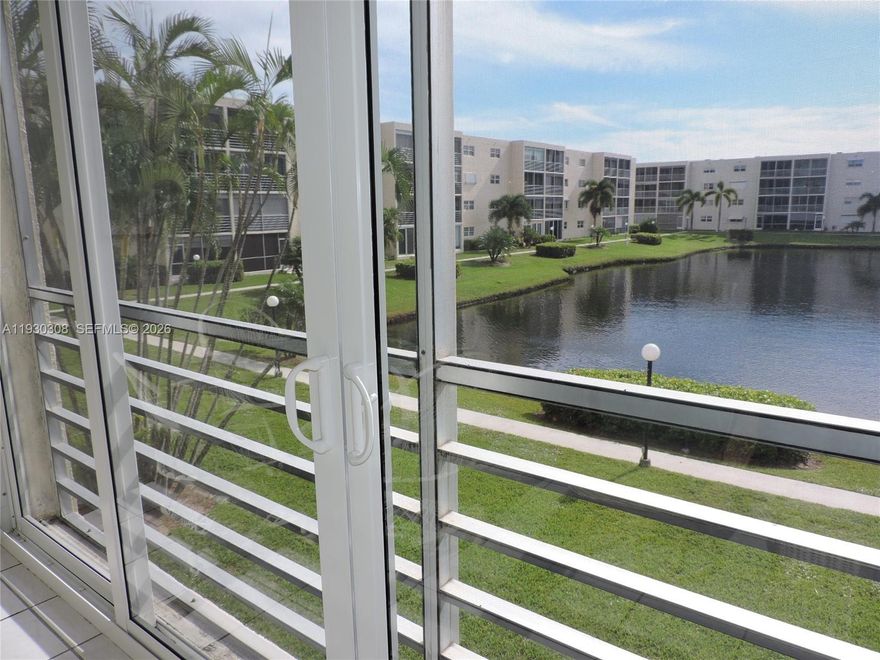 Fully Furnished turnkey large 2 bedrooms, 2 bathrooms condo, east of US1, 1 mile from the beach, centrally located 5 minutes to Port Everglades and Fort Lauderdale Airport. Walking distance to Restaurants, Starbucks, Publix, Walmart, Markets, Casino and State Parks. Beautiful updated, impressive views of lake from screened in porch with hurricane proof glassed sliding doors. South Exposure and Saltwater Heated pool, large community room with activities and completely remodeled unit. NEW A/C, HEPA FILTER AIR & WATER PURIFIER throughout, TANKLESS water heater. New roof, new elevator, new paved parking lot, beautifully maintained community. Deeded parking spot right outside the unit and tons of guest parking. Well-kept building and community. Roof, Painting and Parking lot done in 2023. 
NO assessments. 40-year inspection and SIRS done! LOW HOA, MOVE-IN READY 
FURNITURE AND ITEMS IN UNIT ARE INCLUDED IN SALE
FULL RESERVES, LOW HOA!! 10% down for bank loans.