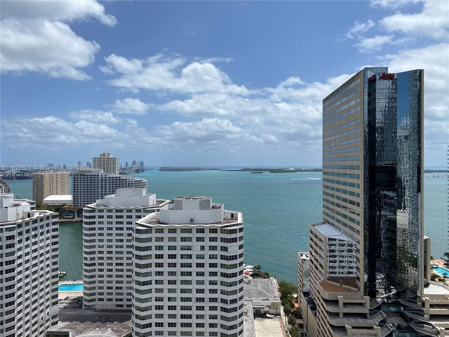 Fabulous bay views from this one bedroom, one bathroom unit at The Plaza on Brickell.  Stainless steel appliances and granite countertops in the Kitchen area.  Gray laminate floors throughout. Amenities include: Fitness Center, Party room, Business Center, swimming pool and 24hs gated security. It comes with one assigned parking space #628.  Please allow 24 hours for showings. Tenant occupied until November 30th 2024.