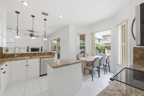 Tiny photo for 4909 NW 115th Way, Coral Springs, FL 33076 (MLS # A12029475)
