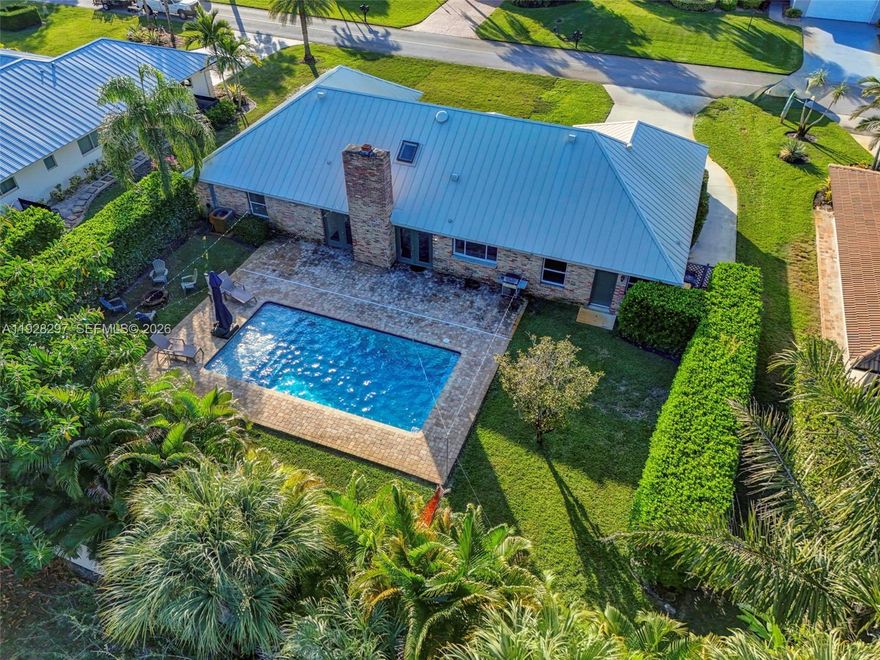 Amazing location in Yacht & country club (YCC) of Stuart, only 4 parcels away from the clubhouse&golf. The home has been excellently maintained , the interior has been updated. Wood burning fireplace in the living room.. Exit the home from a double set of French doors to a brick paver patio. Large backyard with a fire pit, a pool with sun shelf & child safety fence +8’hedges on the north/south sides of the backyard; this is an awesome backyard with lots of privacy. This is a spacious 3 bedroom, 2 baths, downstairs plus a den with another bedroom & ensuite bath upstairs

Roof 2014, A/C 2017, new drain field installed Nov 2025
 
YCC has a dog park which is located near the sports facility.

Ycc memberships are available for purchase, they are NOT mandatory. YCC members have access to the clubhouse, bocce courts, pickle ball, tennis courts, a fitness center, Limited golf memberships available$. Inquire with the club directly to see if you want to join as a social (single or family) or golf (executive or young professional) member. 

Located a short drive from downtown, grocery stores, Stuart private airport, Martin county parks, public boats ramps, Sailfish pool. The beach & Elliott museum are a short drive to the east. Approximately 45 minutes from PBI airport and the WPB Brightline high speed rail station.