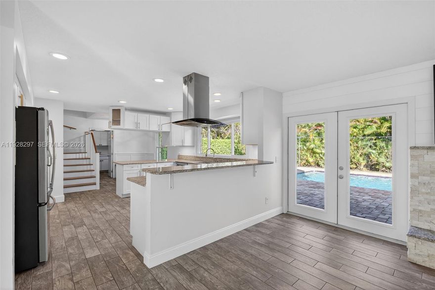 Amazing location in Yacht & country club (YCC) of Stuart, only 4 parcels away from the clubhouse&golf. The home has been excellently maintained , the interior has been updated. Wood burning fireplace in the living room.. Exit the home from a double set of French doors to a brick paver patio. Large backyard with a fire pit, a pool with sun shelf & child safety fence +8’hedges on the north/south sides of the backyard; this is an awesome backyard with lots of privacy. This is a spacious 3 bedroom, 2 baths, downstairs plus a den with another bedroom & ensuite bath upstairs

Roof 2014, A/C 2017, new drain field installed Nov 2025
 
YCC has a dog park which is located near the sports facility.

Ycc memberships are available for purchase, they are NOT mandatory. YCC members have access to the clubhouse, bocce courts, pickle ball, tennis courts, a fitness center, Limited golf memberships available$. Inquire with the club directly to see if you want to join as a social (single or family) or golf (executive or young professional) member. 

Located a short drive from downtown, grocery stores, Stuart private airport, Martin county parks, public boats ramps, Sailfish pool. The beach & Elliott museum are a short drive to the east. Approximately 45 minutes from PBI airport and the WPB Brightline high speed rail station.