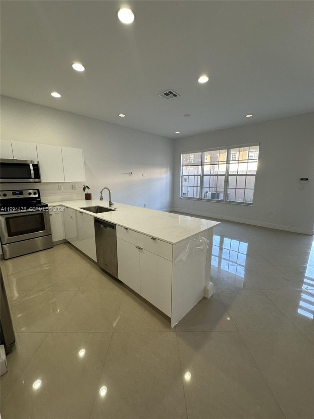 Photo of 14623 SW 7th St #4-12, Pembroke Pines, FL 33027 (MLS # A11994476)