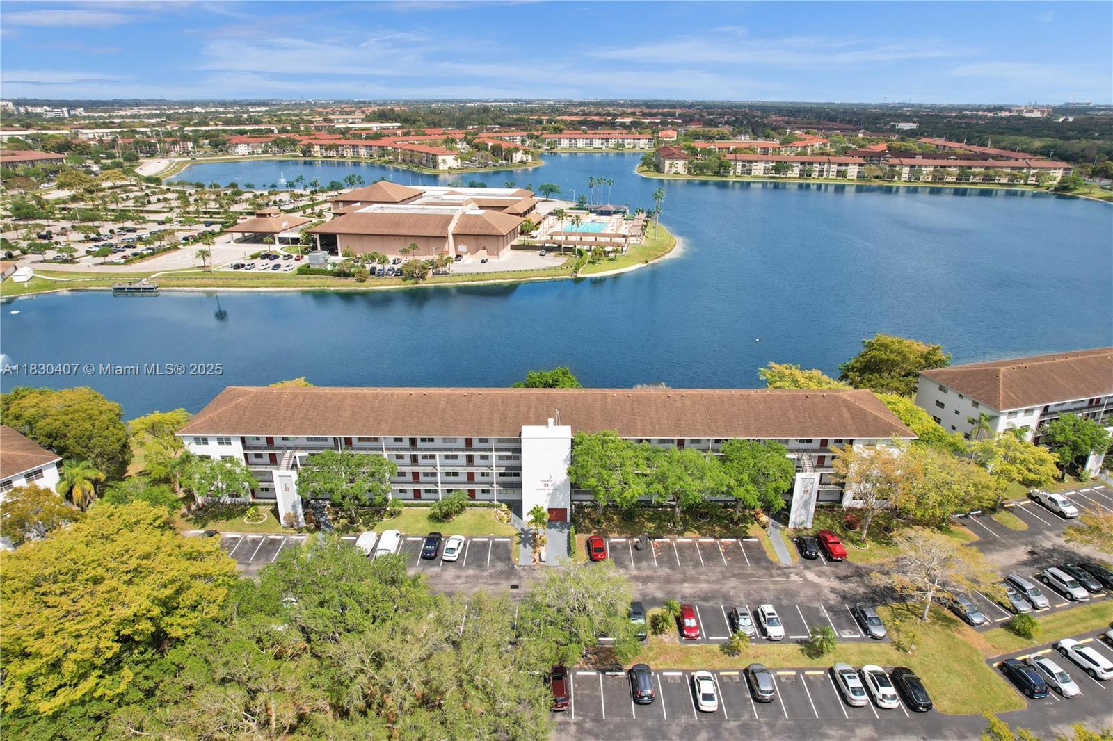 Light and bright with stunning water views - your private oasis awaits! This gorgeous penthouse floor 1 bed, 1.5 bath home features an open concept layout with laminate flooring throughout spacious living areas, a generously sized kitchen and large master suite. Enjoy the outdoors with a screened balcony & premium water views! Century Village offers resort style amenities including a luxury clubhouse with theater, bingo, billiards, pool, sauna, gym, golf, tennis, pickleball, courtesy bus & more! Great location close to excellent shopping, dining, hospitals & transportation! 55+ community, no pets allowed.