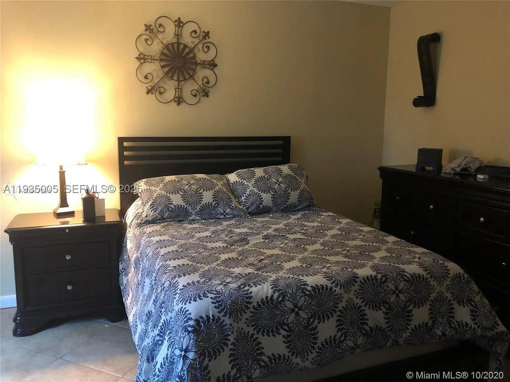 Photo of 9440 SW 8th St #402, Boca Raton, FL 33428 (MLS # A11935005)