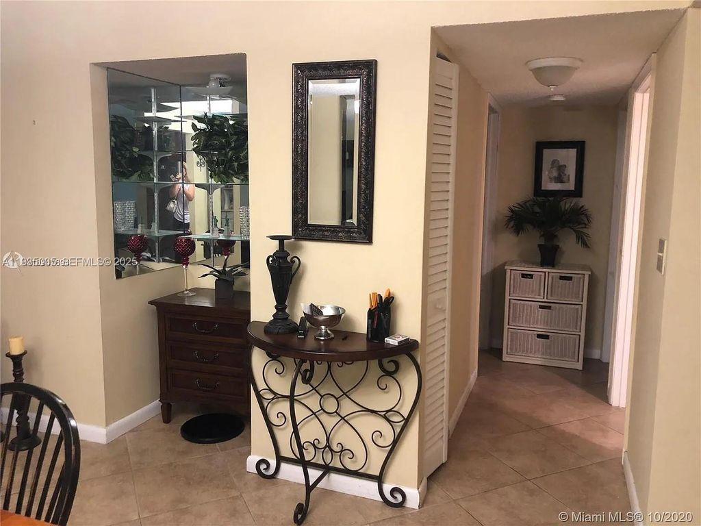 Photo of 9440 SW 8th St #402, Boca Raton, FL 33428 (MLS # A11935005)