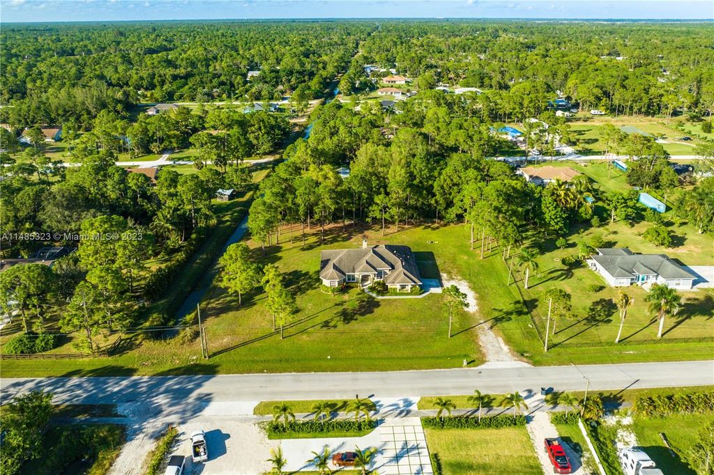 Photo of 15251 Tangerine Blvd, Loxahatchee, FL 33470 (MLS # A11485323)