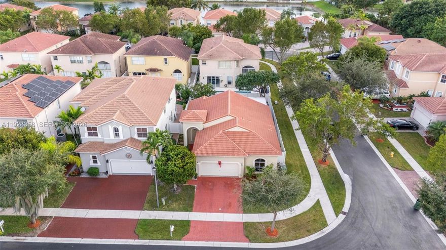 Welcome to this charming 3-bedroom, 2-bath single-family home built in 2005, perfectly situated on a desirable corner lot with plenty of yard space. This is the best-priced home in the highly sought-after, family-friendly Waterstone Portofino Lakes community. Enjoy the peace of mind that comes with living in a gated neighborhood featuring strict security guidelines, video surveillance, and a truly safe environment. Residents benefit from resort-style amenities, including a beautiful clubhouse available for events, a large community pool, playgrounds, and some of the nicest holiday decorations in the area all with a low HOA fee that’s worth every penny. Don’t miss this incredible opportunity!