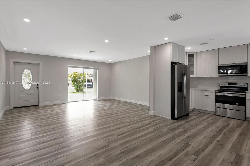 Photo of 361 NW 49th Ave, Plantation, FL 33317 (MLS # A11681247)